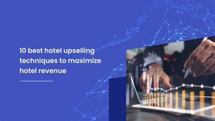 What is upselling in a hotel?