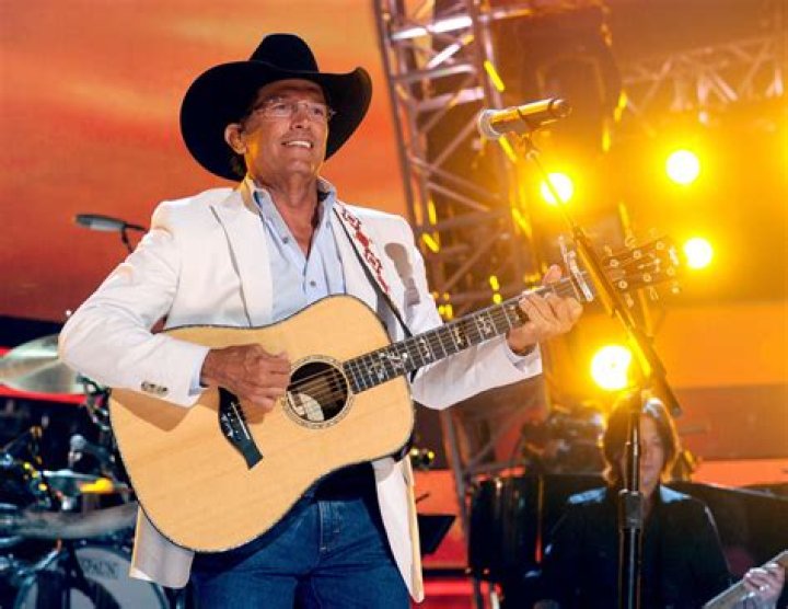 What kind of guitar does George Strait play?
