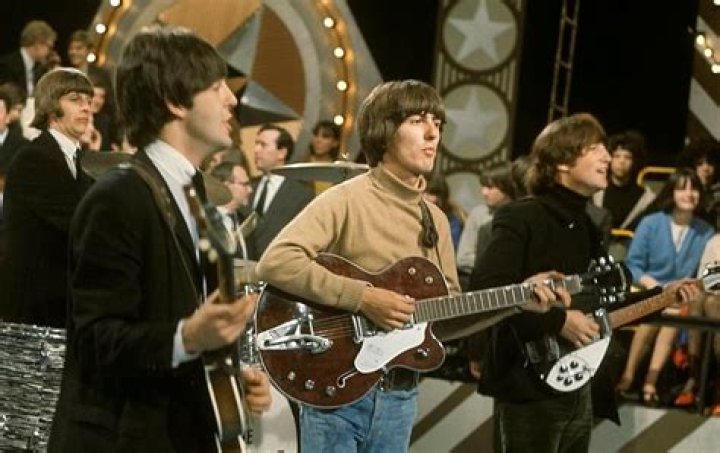 Who played the guitar solo on taxman?