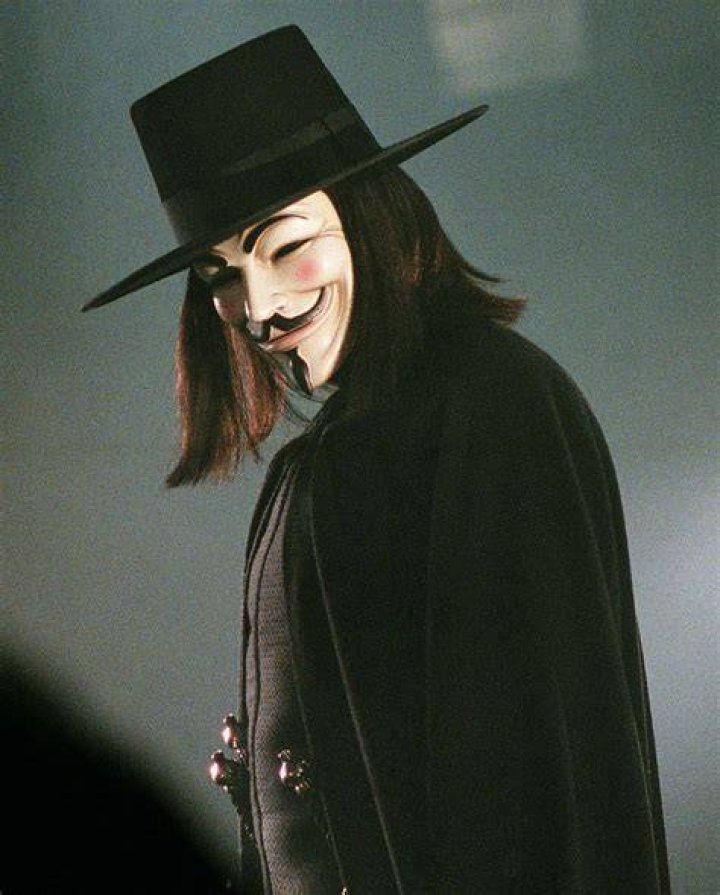 Why does V wear a Guy Fawkes mask?