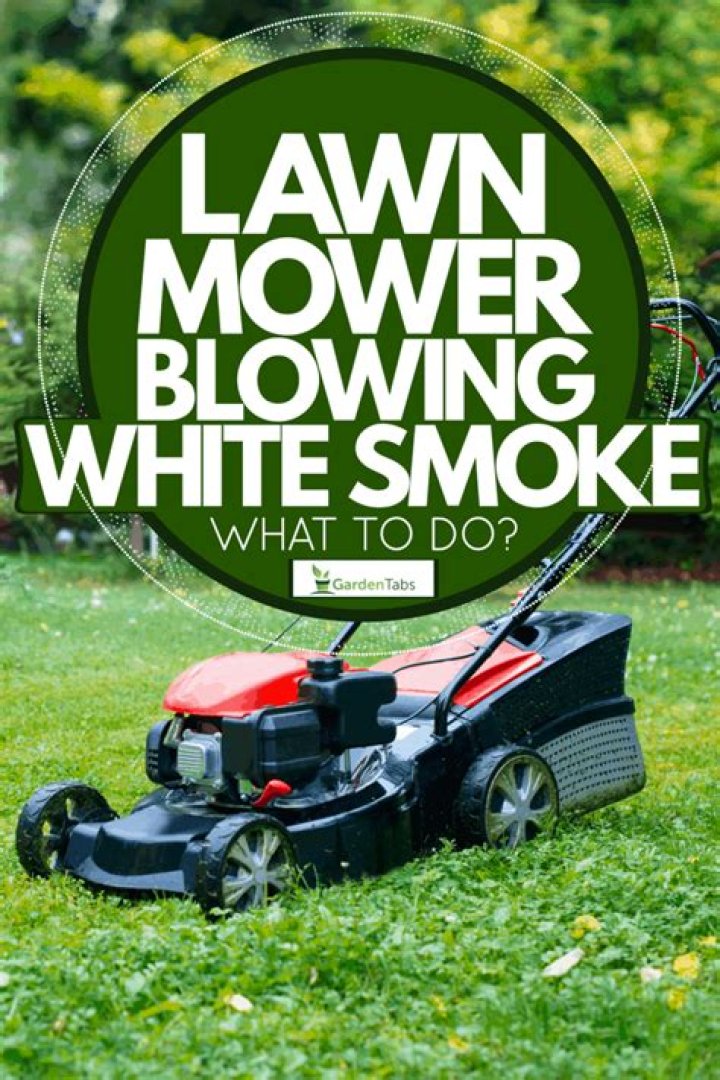 Why is my mower blowing white smoke?